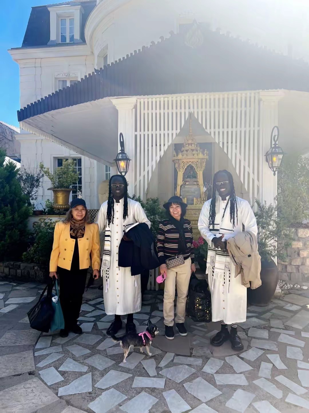 Mystic Twins traveling abroad in traditional dress