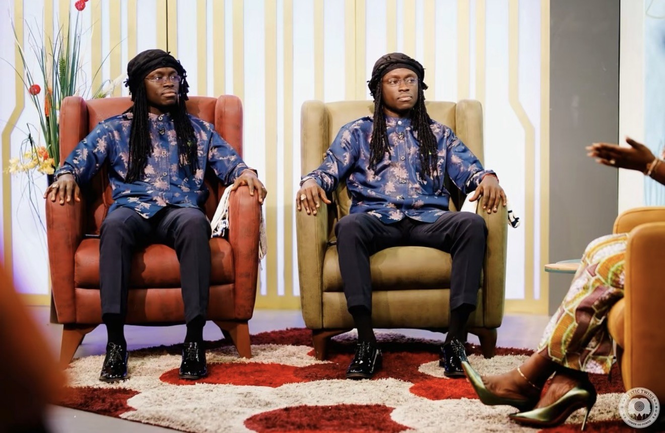 Mystic Twins seated for a television interview