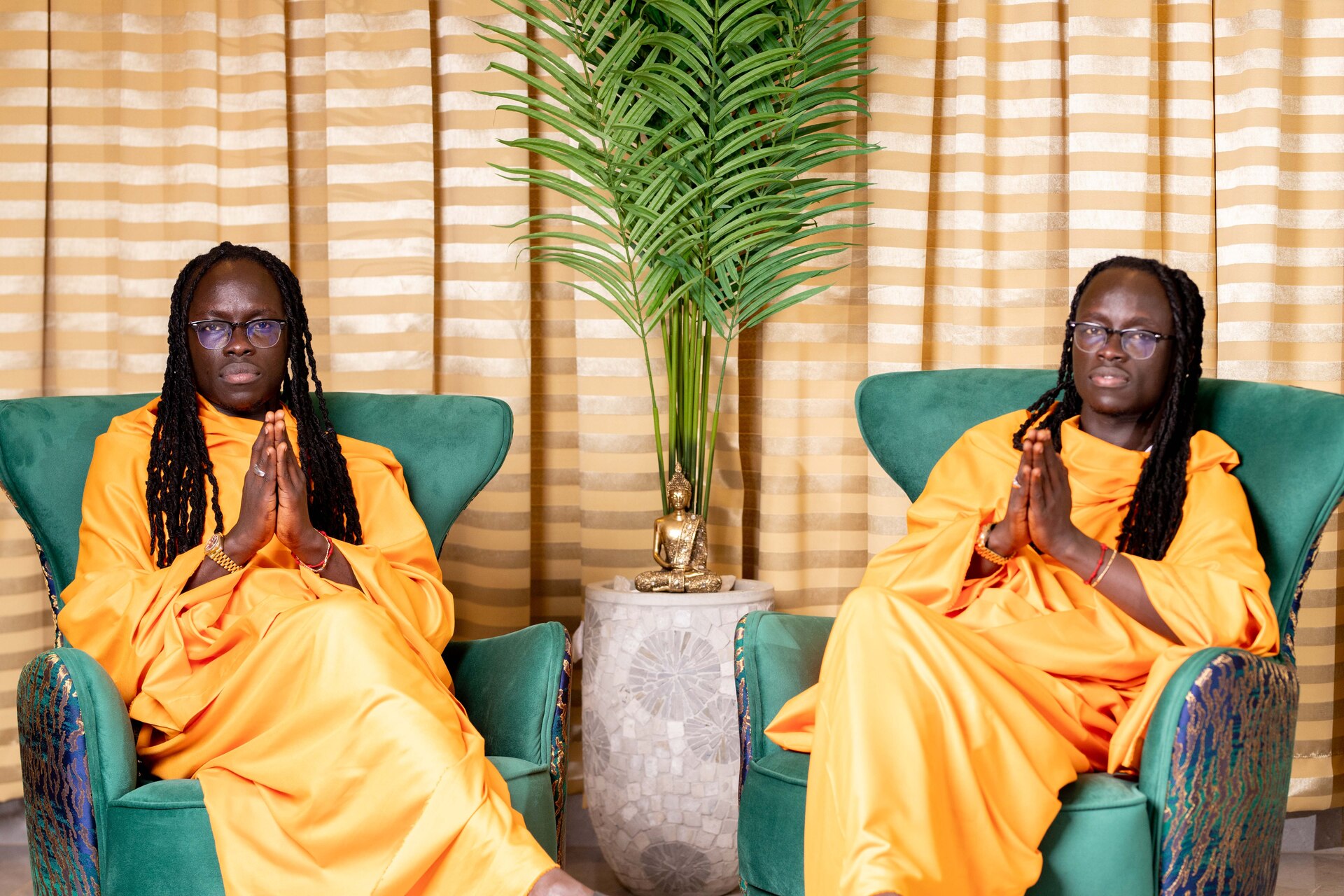 The Mystic Twins in traditional attire
