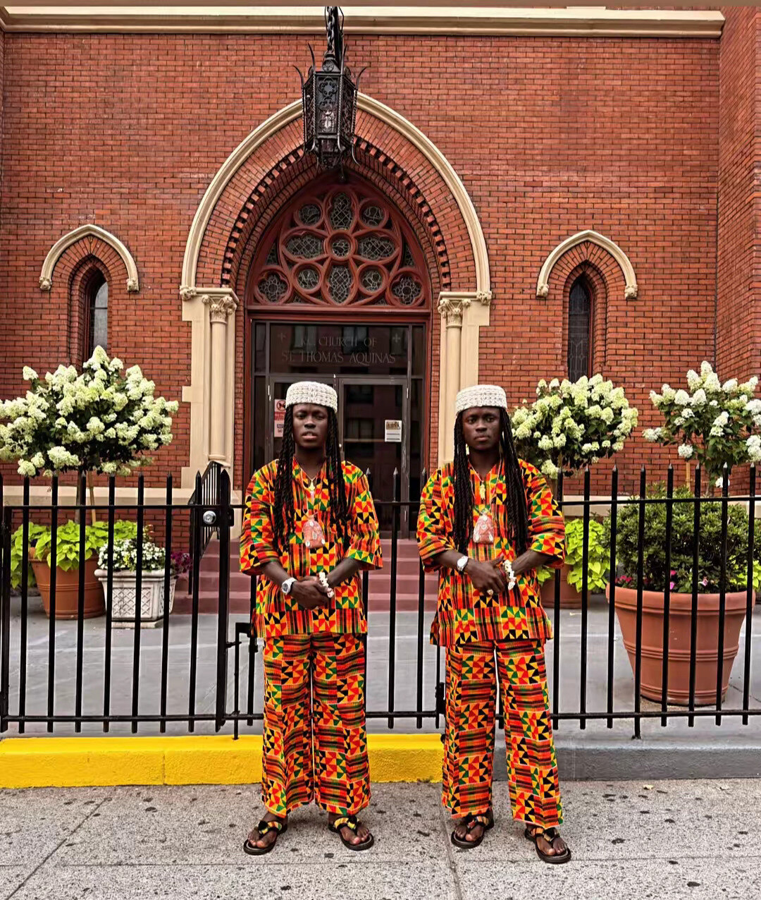 The Mystic Twins in gold robes